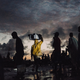 Artisanal fishermen sell their wares in Joal Fadiouth, Senegal, as night falls.
